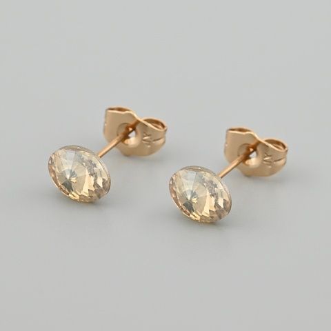 Сережки з кристалами Swarovski 53406 розмір 8х6 мм колір шампань вага 1.0 г позолота 18К 53406Кшамп фото