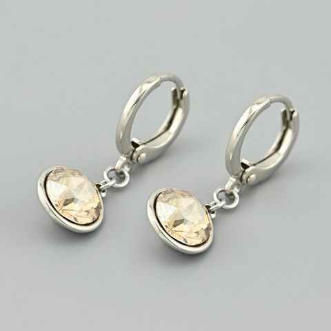 Серьги подвески с кристаллами Swarovski 45575 размер 25х9 мм цвет шампань вес 2.7 г позолота Белое Золото 45575БЗшамп фото