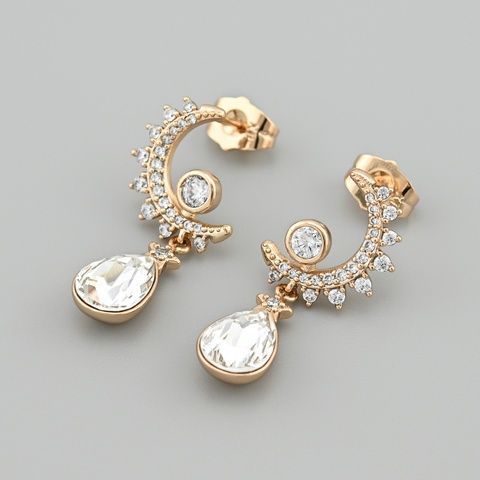 Сережки з кристалами Swarovski 53421 розмір 32х11 мм колір білий вага 4.7 г позолота 18К 53421Кбіл фото