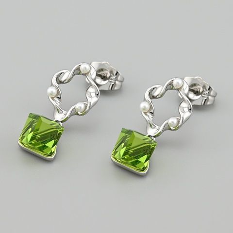Серьги с кристаллами Swarovski 48891 размер 25х11 мм цвет зеленый вес 3.1 г позолота Белое Золото 48891БЗзел фото