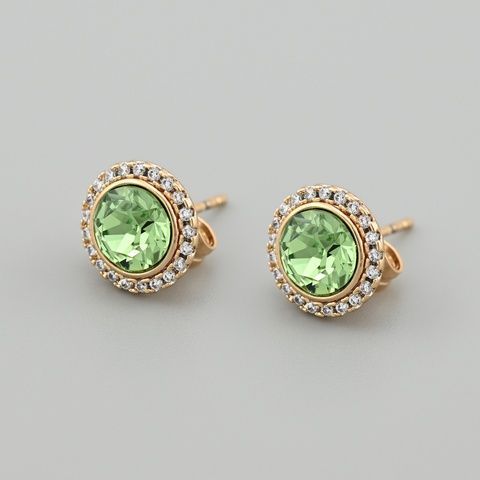 Сережки з кристалами Swarovski 53412 розмір 10х10 мм колір салатовий вага 2.5 г позолота 18К 53412Ксал фото