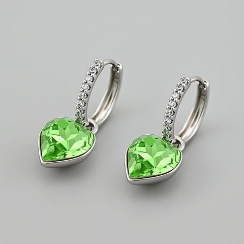 Сережки з кристалами Swarovski 53424 розмір 29х11 мм колір салатовий вага 6.6 г позолота Біле Золото 53424БЗсал фото