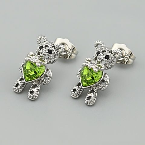 Серьги Teddy с кристаллами Swarovski 45568 размер 18х10 мм цвет салатовый вес 3.3 г позолота Белое Золото 45568БЗсал фото